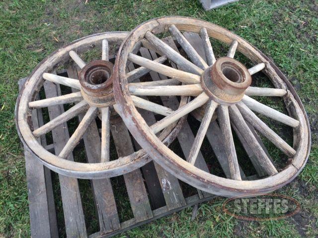 (2) Antique wood spoke wagon wheels